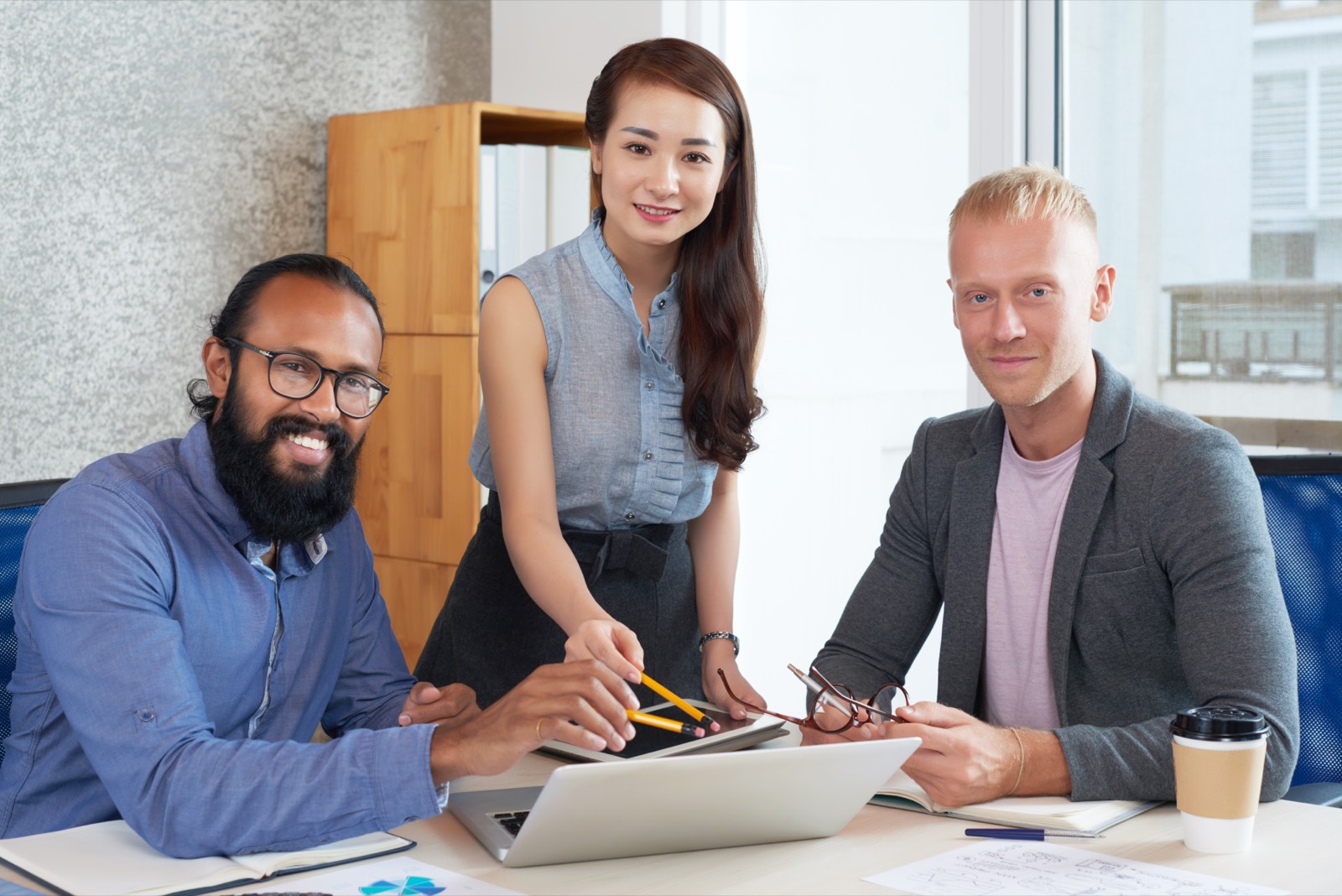 Young business professionals working together as a team